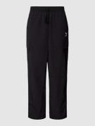 PUMA PERFORMANCE Sweatpants mit Label-Stitching in Black, Größe S