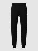 CHAMPION Regular Fit Sweatpants mit elastischem Bund in Black, Größe X...