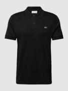 Lacoste Regular Fit Poloshirt in unifarbenem Design in Black, Größe M