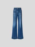 Victoria Beckham Flared Jeans mit Label-Stitching in Dunkelblau, Größe...