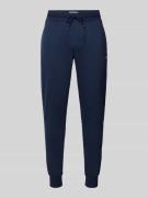 Tommy Jeans Slim Fit Sweatpants in Melange-Optik in Blau, Größe M