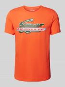 Lacoste T-Shirt mit Label-Print in Orange, Größe M