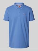 Tommy Jeans Slim Fit Poloshirt mit Logo-Stitching in Blau, Größe S