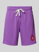 CHAMPION Regular Fit Sweatshorts mit Logo-Badge in Lila, Größe L