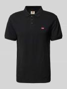 Levi's® Poloshirt mit Label-Stitching in Black, Größe M