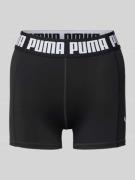 Puma Skinny Fit Shorts mit Label-Bund in Metallic Black, Größe L