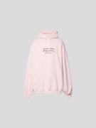 VETEMENTS Oversized Hoodie mit Label-Stitching in Hellrosa, Größe L