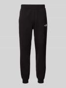 PUMA PERFORMANCE Sweatpants mit Logo-Stitching in Black, Größe L