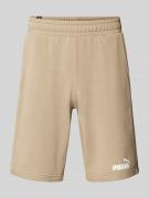 PUMA PERFORMANCE Sweatshorts mit elastischem Bund in Beige, Größe L