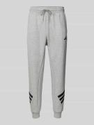 ADIDAS SPORTSWEAR Regular Fit Sweatpants mit Label-Stitching in Mittel...