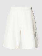 CK Calvin Klein Regular Fit Sweatshorts im unifarbenen Design in Offwh...