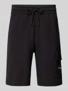 Calvin Klein Jeans Sweatshorts mit Label-Stitching in Black, Größe L