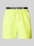 Calvin Klein Underwear Badehose mit Label-Print in GELB, Größe M