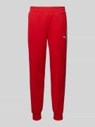 PUMA PERFORMANCE Sweatpants mit Label-Print in Rot, Größe L