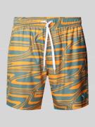 PUMA Relaxed Fit Badeshorts mit Logo-Print Modell 'FORMSTRIP' in Orang...