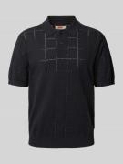 Levi's® Poloshirt mit gerippten Abschlüssen in Black, Größe L