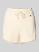 CHAMPION Sweatshorts mit Label-Detail in Ecru, Größe M