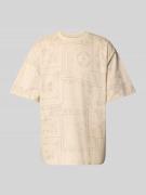 KARL KANI T-Shirt mit Label-Stitching in Beige, Größe L