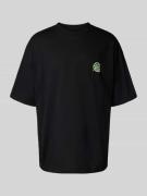 Carhartt Work In Progress Oversized T-Shirt mit Motiv-Print Modell 'He...