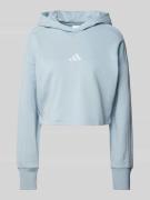 adidas Sportswear Cropped Hoodie mit Label-Stitching in Hellblau, Größ...
