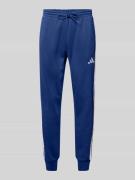 adidas Sportswear Sweatpants mit elastischem Bund in Marine, Größe S