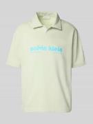 Calvin Klein Jeans Relaxed Fit Poloshirt mit Label-Print in Mint, Größ...