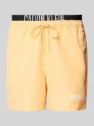 Calvin Klein Underwear Badehose mit elastischem Label-Bund in Orange, ...