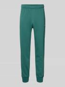 CHAMPION Sweatpants mit elastischem Bund und Label-Stitching in Dunkel...