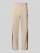 adidas Originals Trainingshose mit Logo Modell 'FIREBIRD' in Beige, Gr...