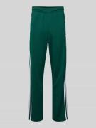 adidas Originals Sweatpants mit elastischem Bund in Gruen, Größe L