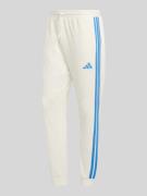 adidas Sportswear Sweathose mit Logo-Detail aus Baumwoll-Mix in Offwhi...