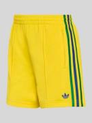 adidas Originals Trainingsshorts mit Label Stitching in GELB, Größe L