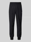 BLKVIS Relaxed Fit Trackpants mit Label-Stitching in Black, Größe M