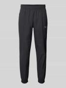 PUMA PERFORMANCE Jogpants mit elastischem Bund Modell 'TECH' in Black,...