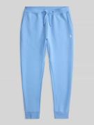 Polo Ralph Lauren Tapered Sweatshorts aus Baumwoll-Mix in Hellblau, Gr...