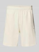CHAMPION Shorts mit elastischem Bund und Label-Stitching in Offwhite, ...