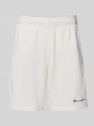 CHAMPION Shorts mit elastischem Bund und Label-Stitching in Offwhite, ...