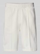 CHAMPION Bermudas mit elastischem Bund und Label-Stitching in Offwhite...