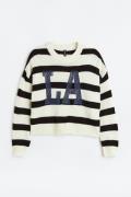 H&M+ Pullover mit Frontmotiv Cremefarben/LA in Größe XL. Farbe: Cream/...