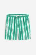 H&M Chino-Shorts Loose Fit Knallgrün/Gestreift in Größe 104. Farbe: Br...