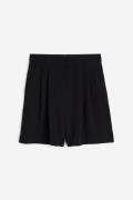 H&M Weite Shorts Schwarz in Größe 48. Farbe: Black
