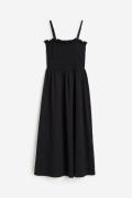 H&M Gesmoktes Kleid Schwarz, Alltagskleider in Größe XS. Farbe: Black
