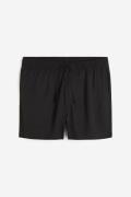 H&M Shorts aus Lyocell Regular Fit Schwarz in Größe XXL. Farbe: Black