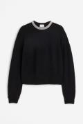H&M Pullover mit Strassverzierung Schwarz in Größe M. Farbe: Black