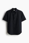 H&M Kurzarmhemd in Regular Fit Schwarz, Freizeithemden Größe XS. Farbe...