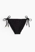 H&M Tie-Tanga Bikinihose Schwarz, Bikini-Unterteil in Größe 34. Farbe:...